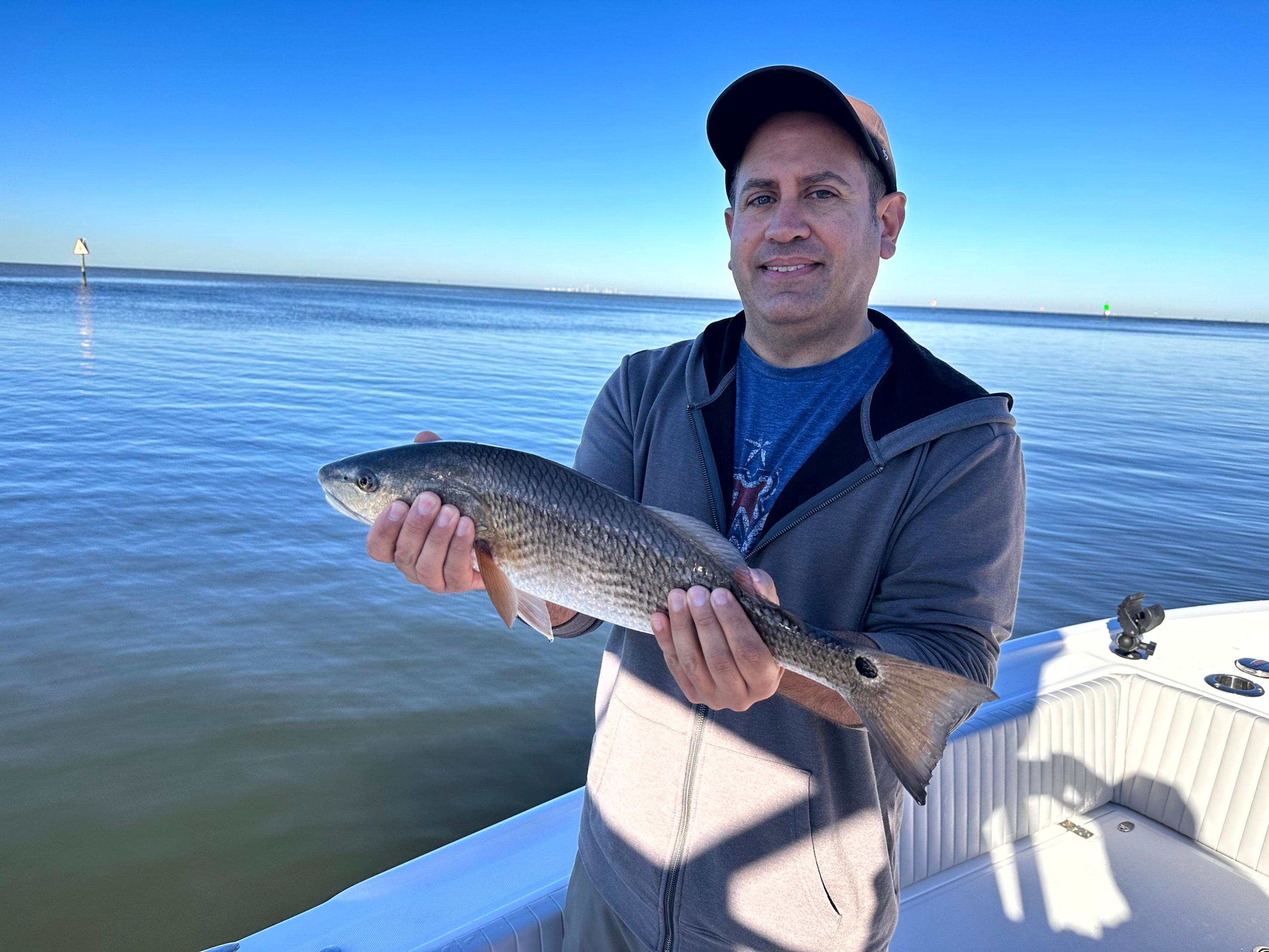 Private fishing charter experience in Tampa Bay with captain and anglers